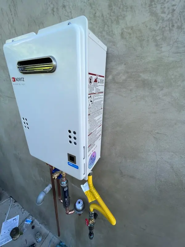 Tankless water heater installation for Twin Lakes Village homes